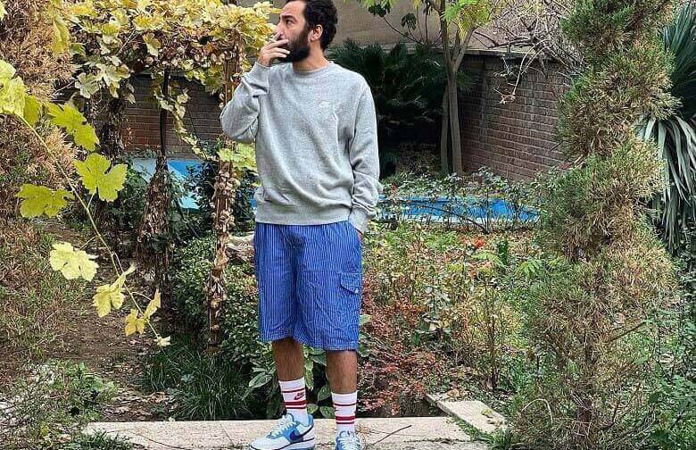 نوید محمدزاده با کفش کتانی و شلوارک دیده شد.